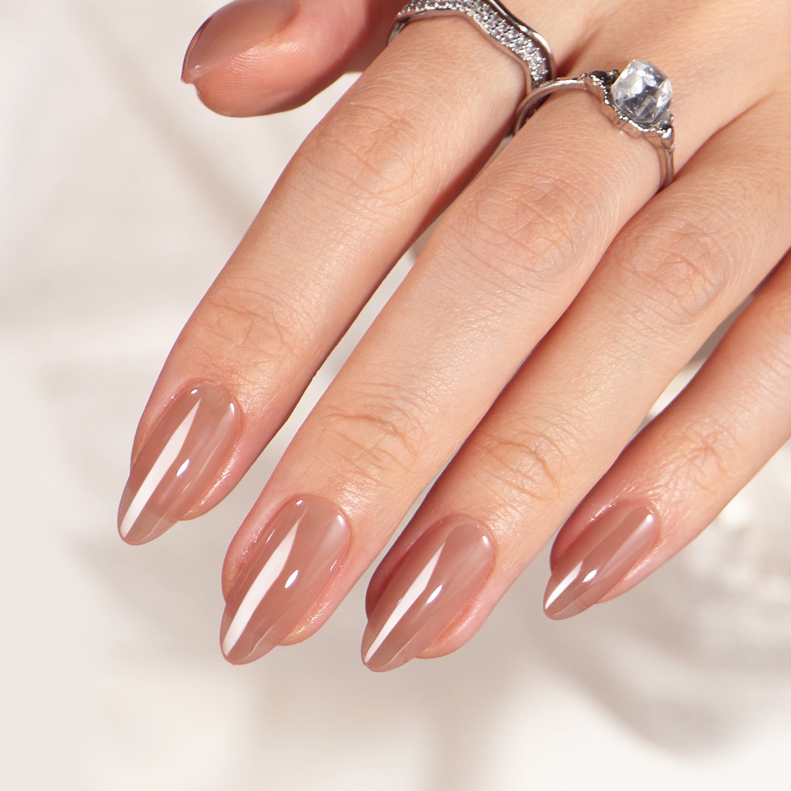 Fixon minimalist nude press-on nails with almond shape