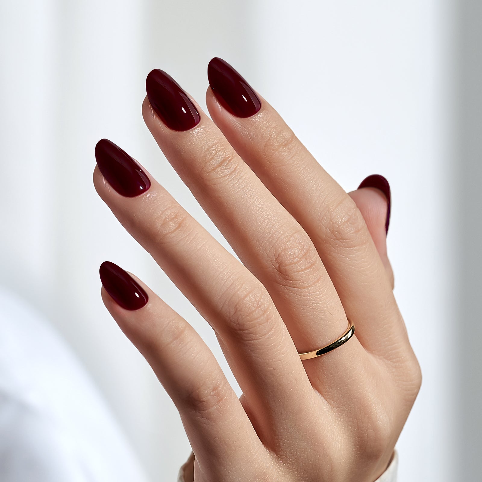 Fixon glossy red press-on nails with almond shape