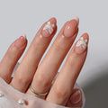 Fixon feminine pink press-on nails with polished finish